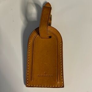 LV bag tag with poigniette